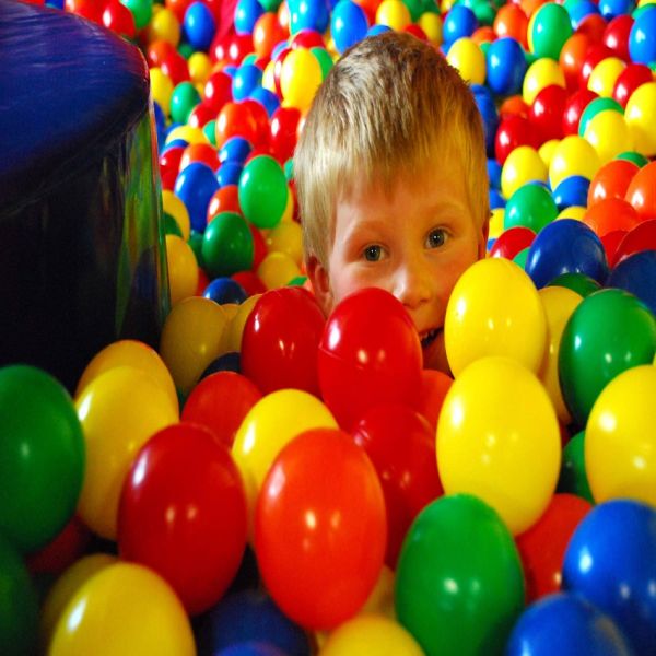 Child in ball pool